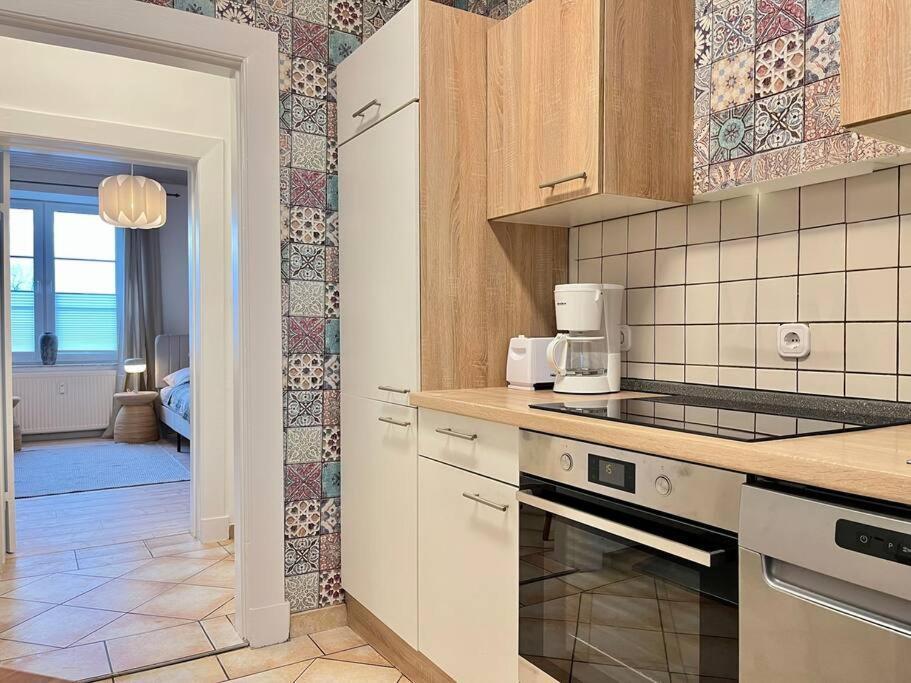 Apartment Perlmutt Mit Balkon ฮูซุม ภายนอก รูปภาพ